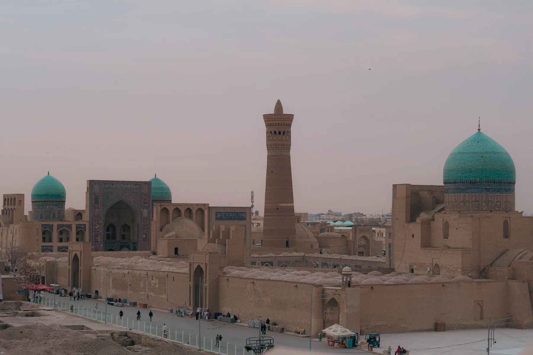 The historic centre of Bukhara and its minaret at dusk