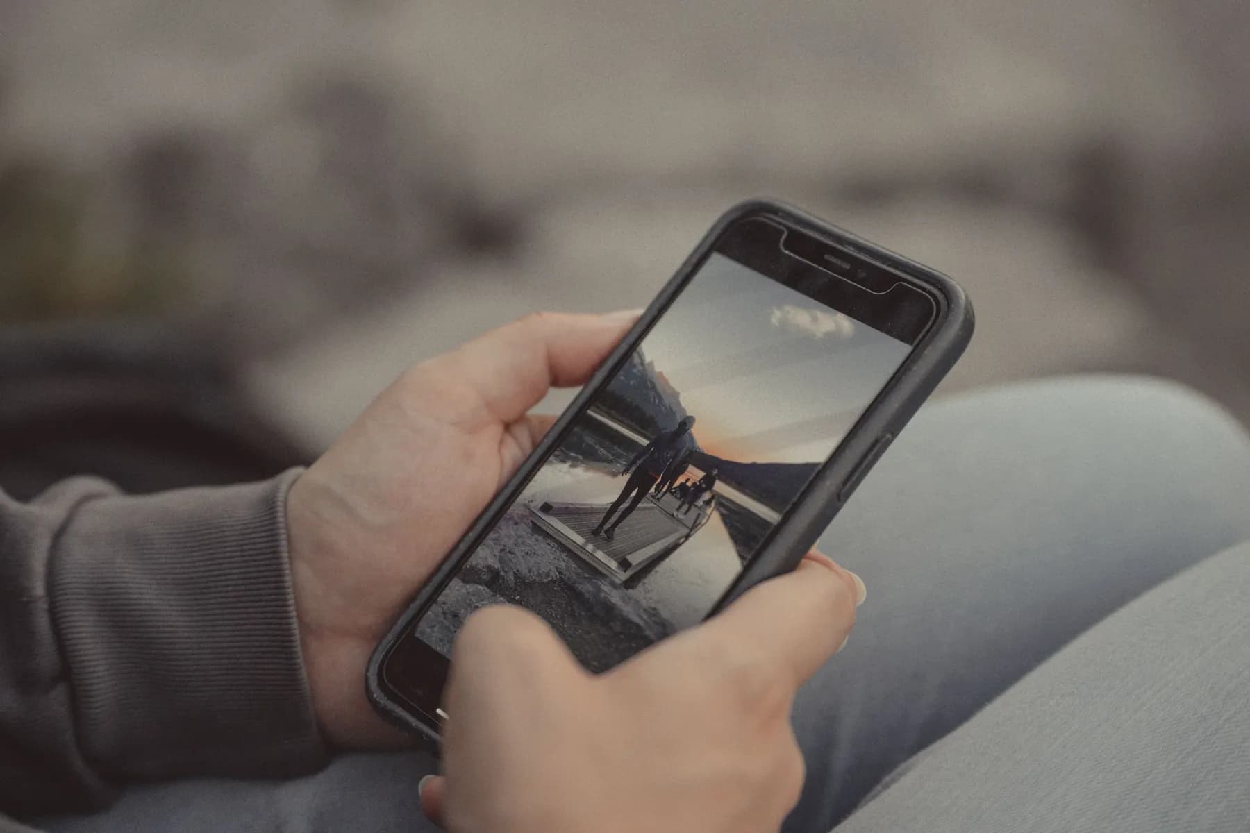 A smartphone held in both hands