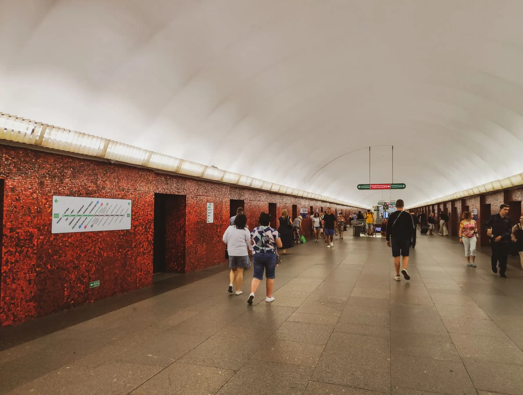 People walking through a metro station