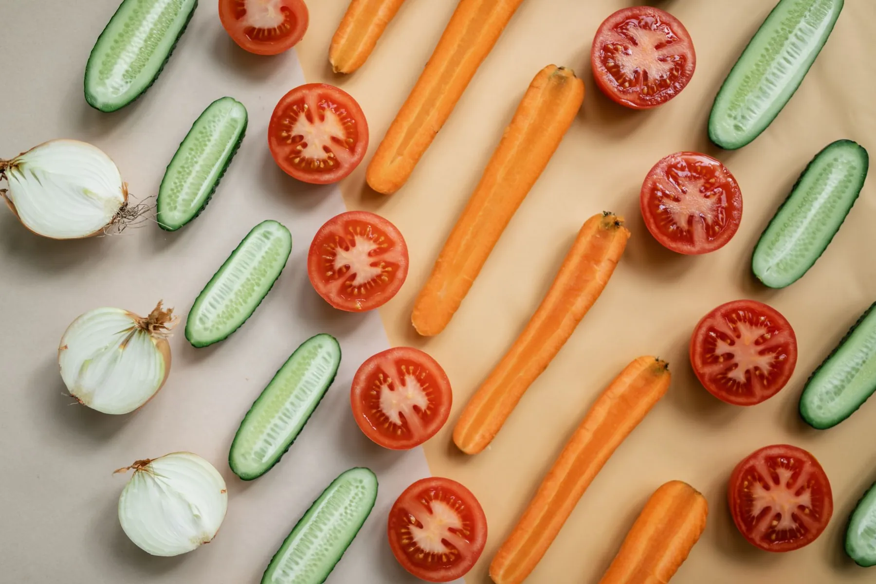 Sliced vegetables: carrots, cucumbers, tomatoes and onions